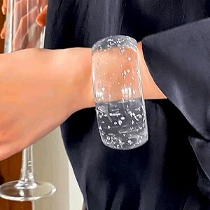 Lucite bangle with silver flecks; nwot